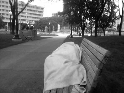 Vagrant Sleeping on a Bench